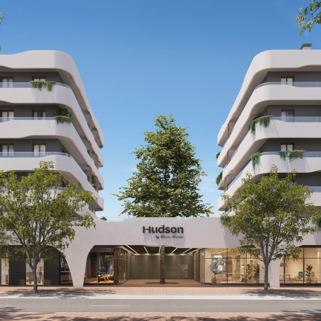 Fachada principal del residencial Hudson en Sant Pere de Ribes. Edificio sostenible con certificación energética y diseño arquitectónico moderno.