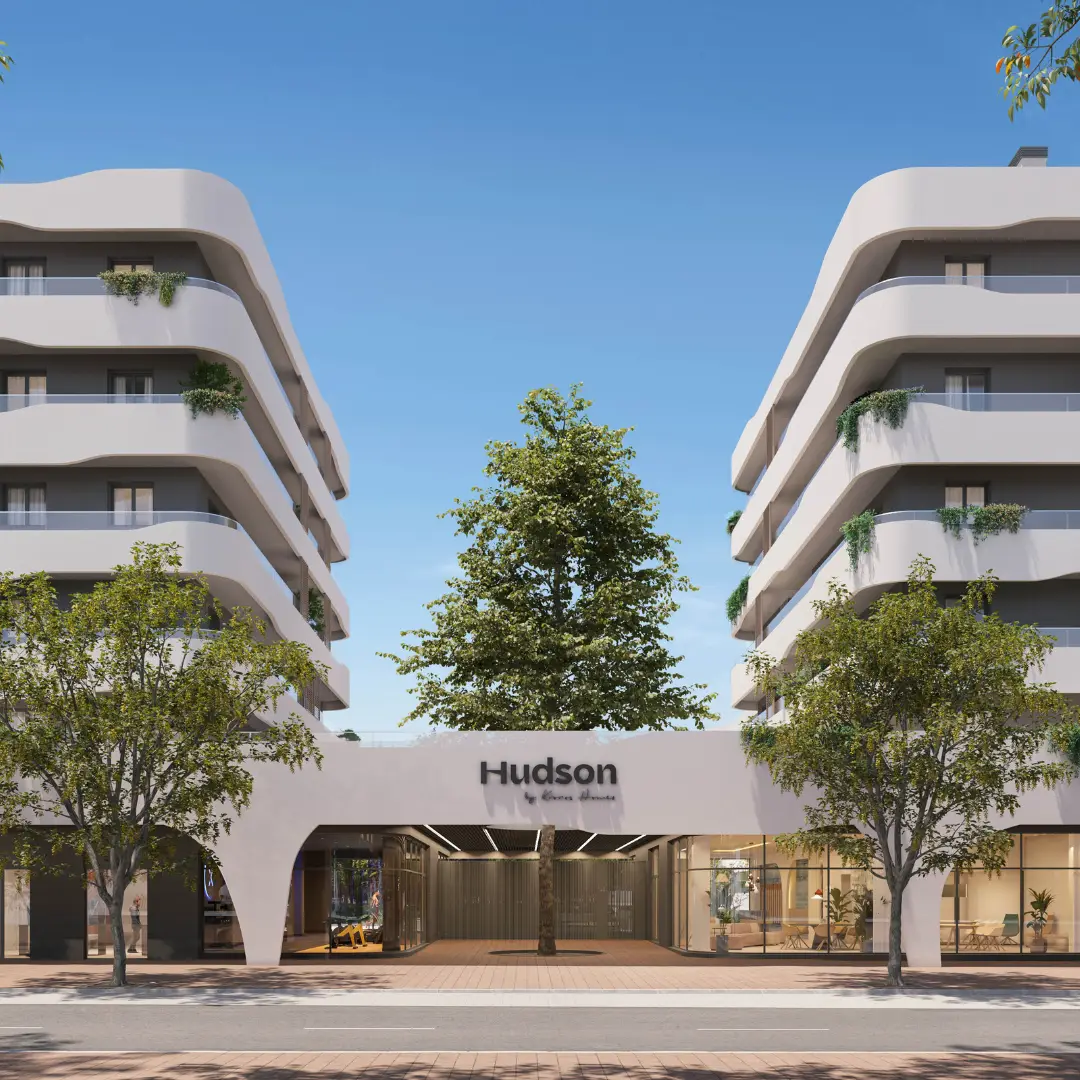 Fachada principal del residencial Hudson en Sant Pere de Ribes. Edificio sostenible con certificación energética y diseño arquitectónico moderno.